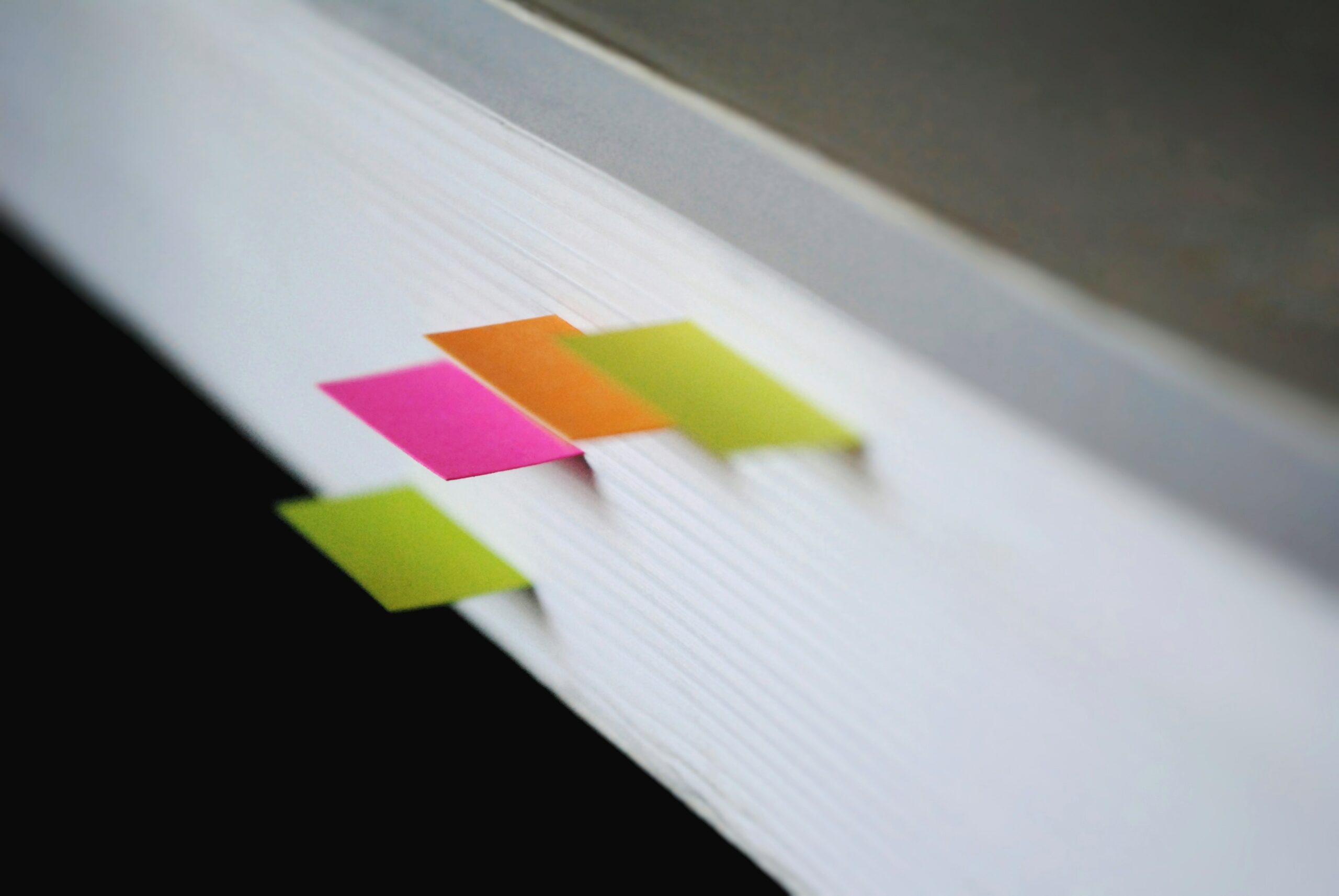 Highlighted sticky notes in a case file